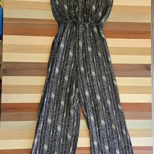 Calvin Klein Black and Gold Striped Jumpsuit. Beautiful Fit Size 4 NWT